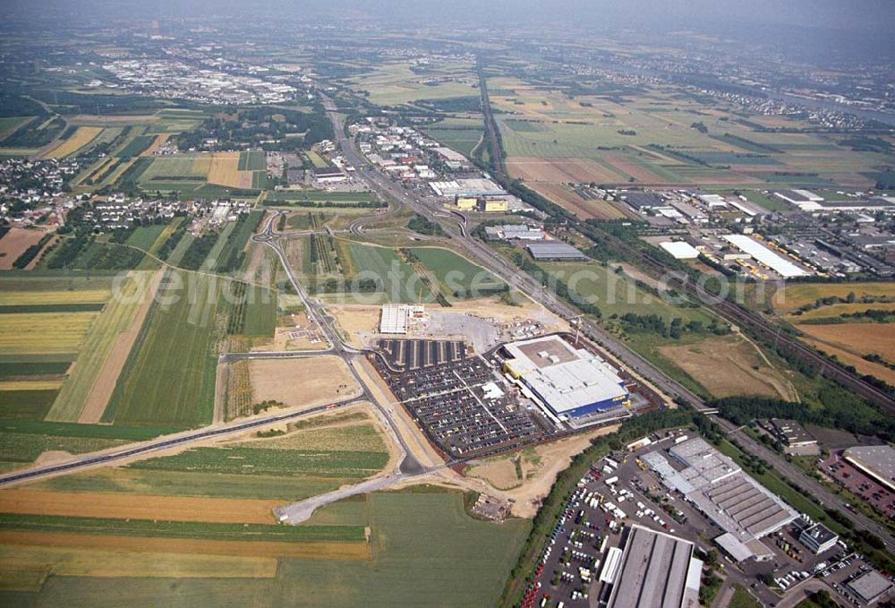 Aerial photograph Koblenz - : Neueröffnung des ersten IKEA Möbel-Kompetenz-Zentrum in Deutschland auf insgesamt 115.000 Quadratmetern Grundstücksfläche.In den Zentren haben Einzelhändler rund um das Thema „Wohnen“ die Möglichkeit, Verkaufsflächen anzumieten. Es werden zusätzliche 150 Arbeitsplätze geschaffen. Als erster Partner von IKEA wird die Firma Saturn Ende Oktober 2006 einen Markt eröffnen. Die gesamten Investitionskosten in das Möbel-Kompetenz-Zentrum betragen ca. 45 Mio. Euro. Es werden ca. 2.075 Parkplätze für Kunden zur Verfügung stehen. Weitere Zentren sind unter an derem in Würzburg, Köln und Bremen geplant.