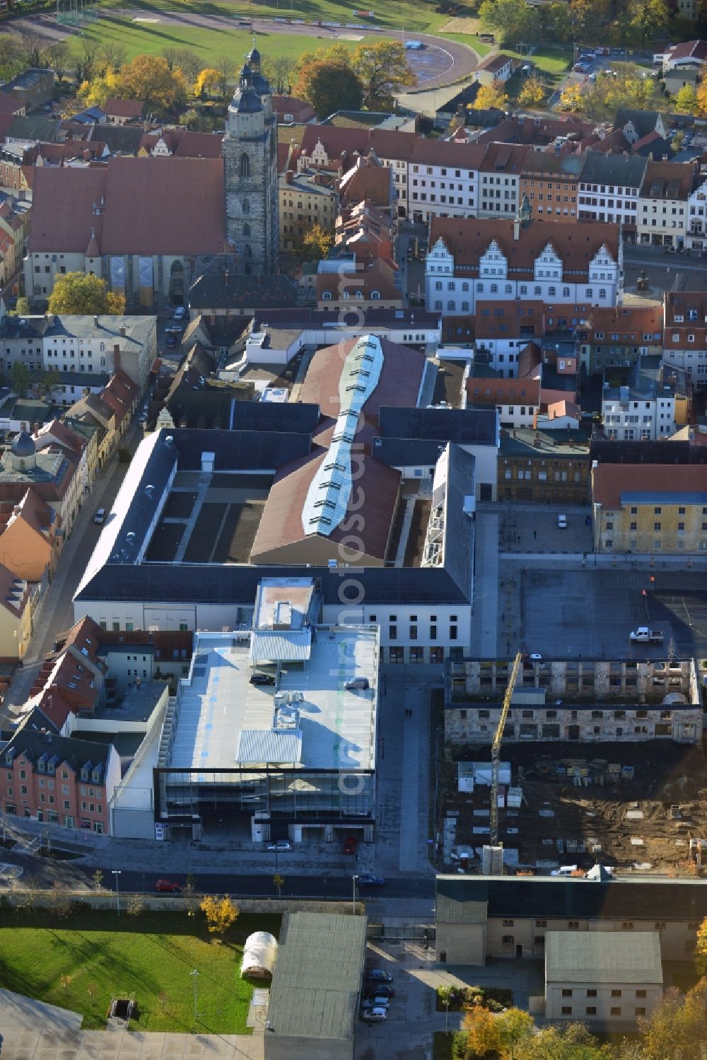 Aerial photograph Wittenberg - View of the construction site of the shopping center Arsenal between the Arsenal square and the market place in the inner city of Wittenberg. Project developers are MIB AG and the OFB Development GmbH