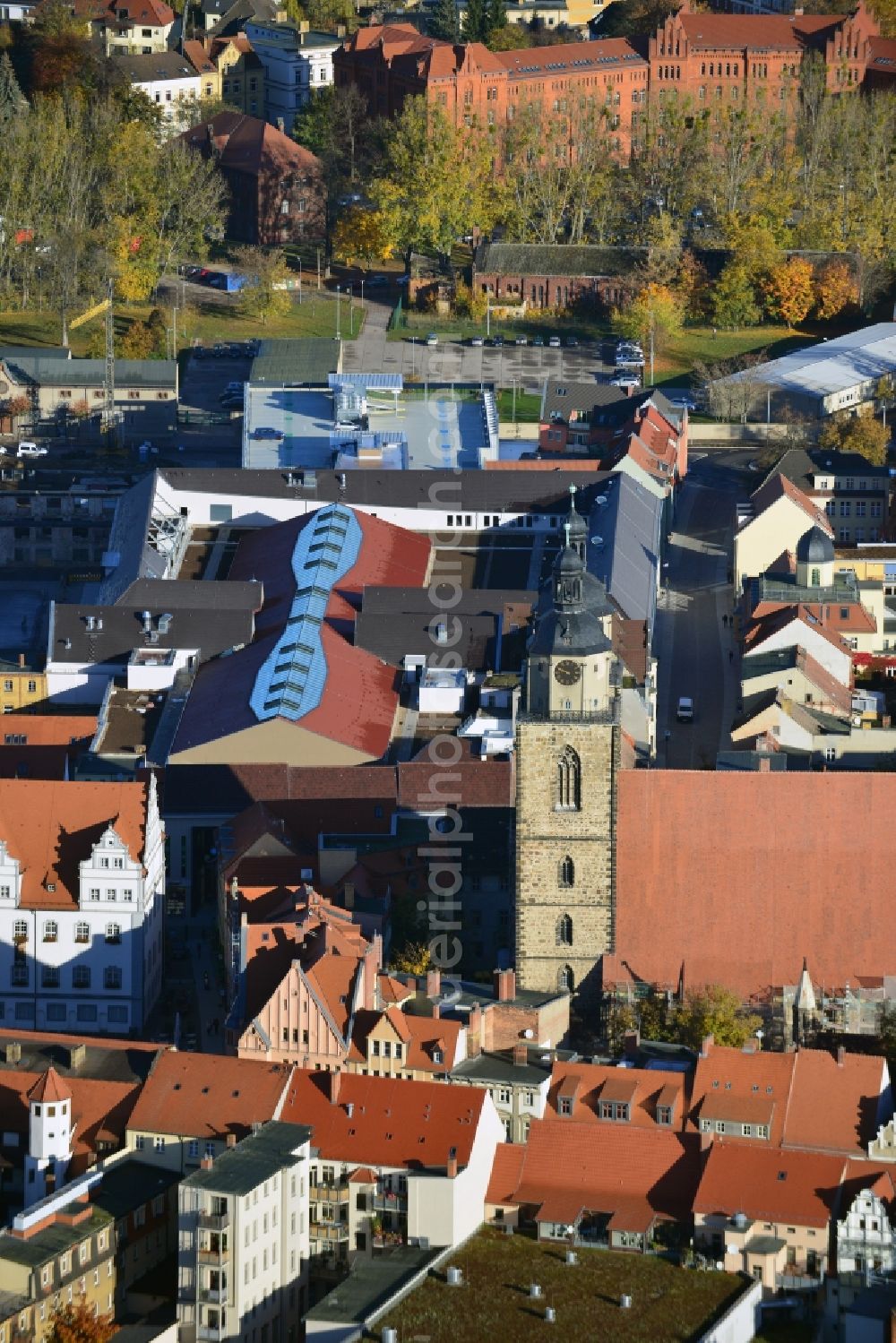 Wittenberg from the bird's eye view: View of the construction site of the shopping center Arsenal between the Arsenal square and the market place in the inner city of Wittenberg. Project developers are MIB AG and the OFB Development GmbH