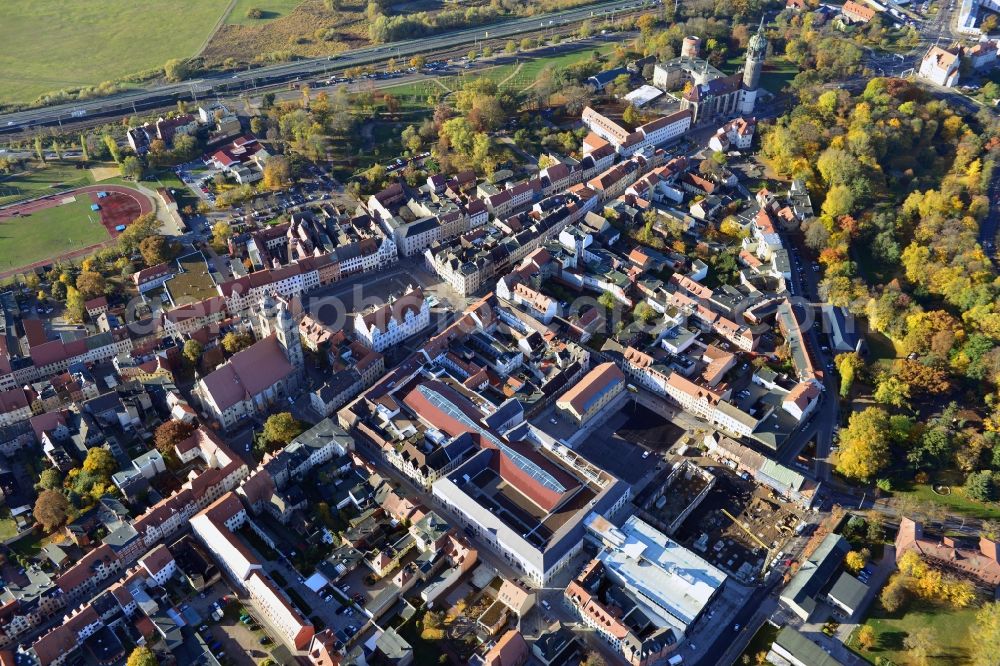 Wittenberg from the bird's eye view: View of the construction site of the shopping center Arsenal between the Arsenal square and the market place in the inner city of Wittenberg. Project developers are MIB AG and the OFB Development GmbH