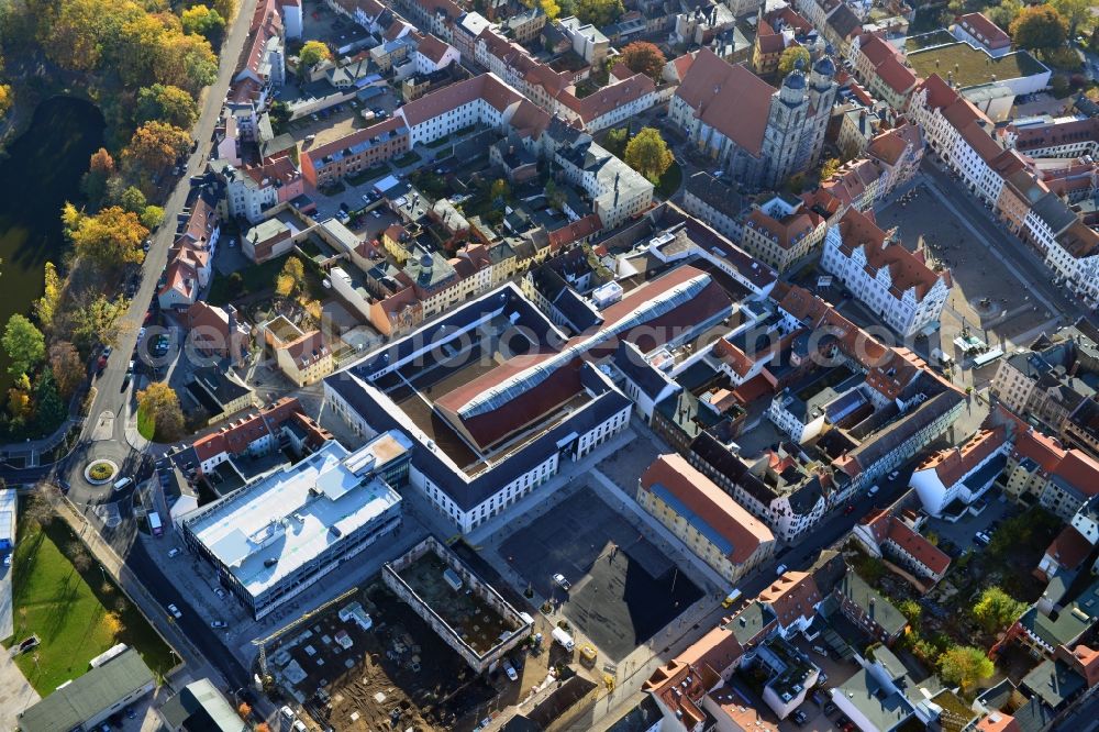 Wittenberg from the bird's eye view: View of the construction site of the shopping center Arsenal between the Arsenal square and the market place in the inner city of Wittenberg. Project developers are MIB AG and the OFB Development GmbH