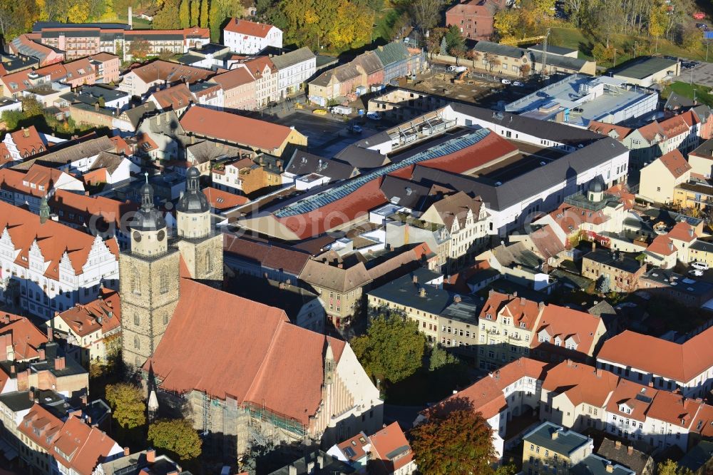 Wittenberg from the bird's eye view: View of the construction site of the shopping center Arsenal between the Arsenal square and the market place in the inner city of Wittenberg. Project developers are MIB AG and the OFB Development GmbH