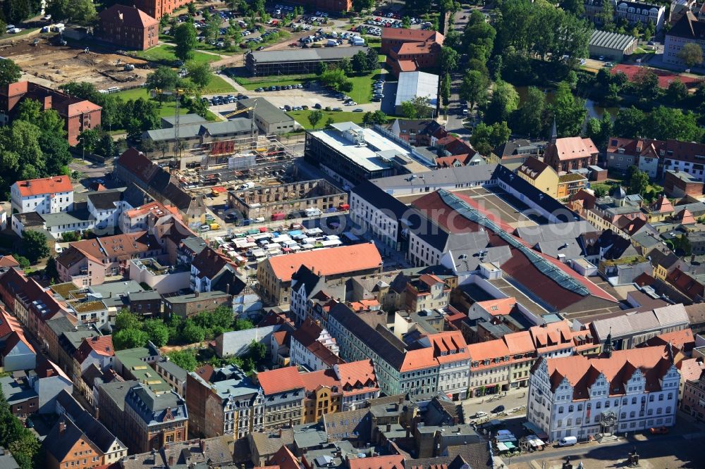 Wittenberg from the bird's eye view: View of the construction site of the shopping center Arsenal between the Arsenal square and the market place in the inner city of Wittenberg. Project developers are MIB AG and the OFB Development GmbH