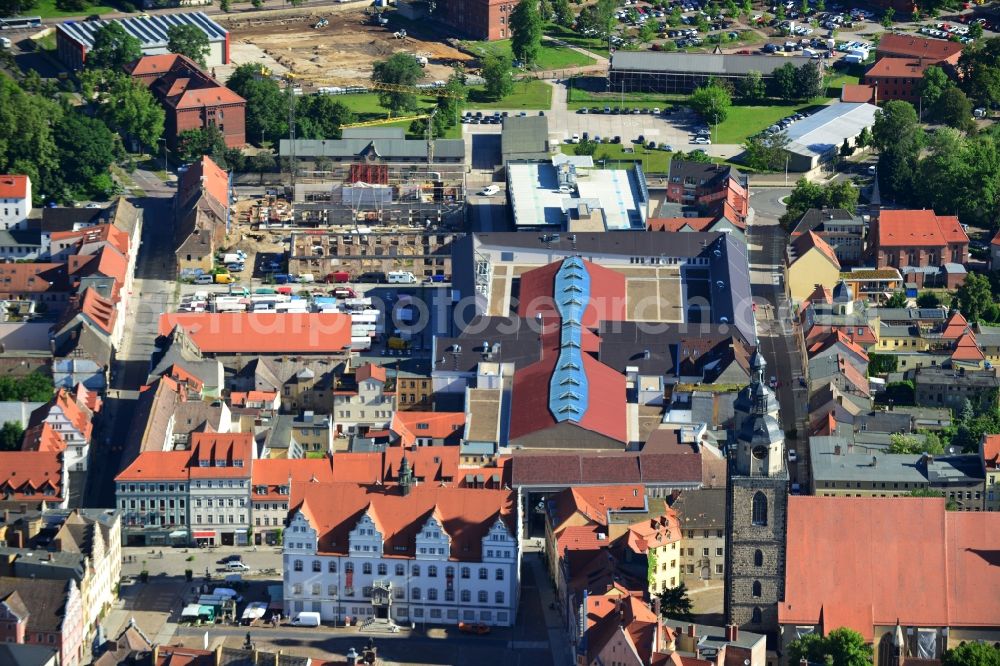 Aerial photograph Wittenberg - View of the construction site of the shopping center Arsenal between the Arsenal square and the market place in the inner city of Wittenberg. Project developers are MIB AG and the OFB Development GmbH