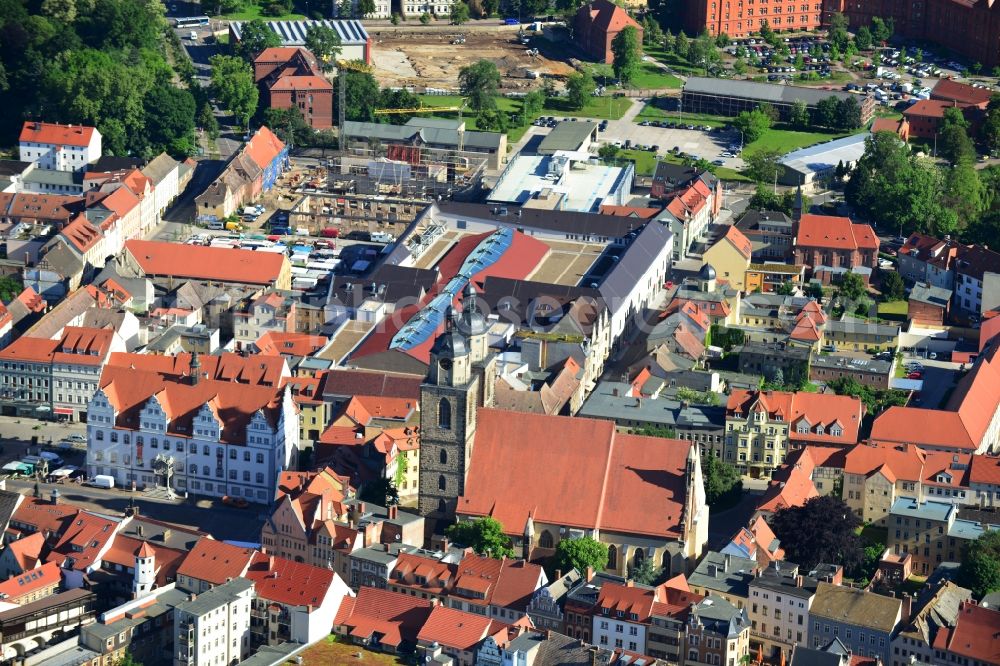 Wittenberg from the bird's eye view: View of the construction site of the shopping center Arsenal between the Arsenal square and the market place in the inner city of Wittenberg. Project developers are MIB AG and the OFB Development GmbH