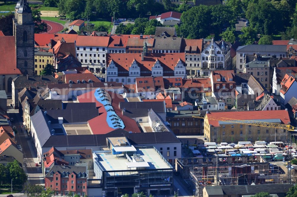 Wittenberg from the bird's eye view: View of the construction site of the shopping center Arsenal between the Arsenal square and the market place in the inner city of Wittenberg. Project developers are MIB AG and the OFB Development GmbH