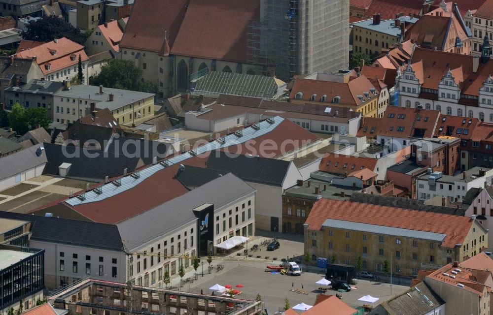 Wittenberg from the bird's eye view: View of the construction site of the shopping center Arsenal between the Arsenal square and the market place in the inner city of Wittenberg. Project developers are MIB AG and the OFB Development GmbH