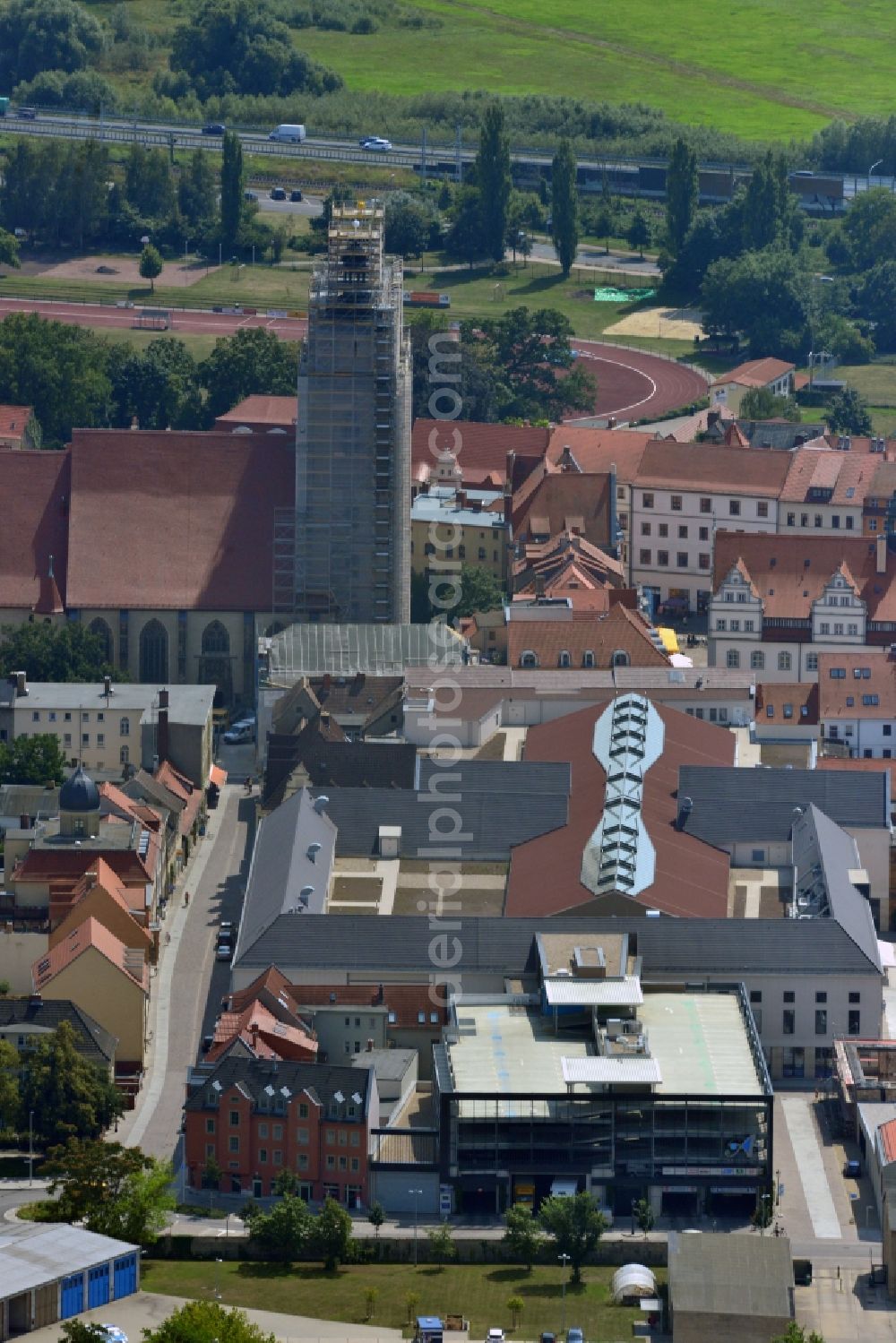 Aerial photograph Wittenberg - View of the construction site of the shopping center Arsenal between the Arsenal square and the market place in the inner city of Wittenberg. Project developers are MIB AG and the OFB Development GmbH