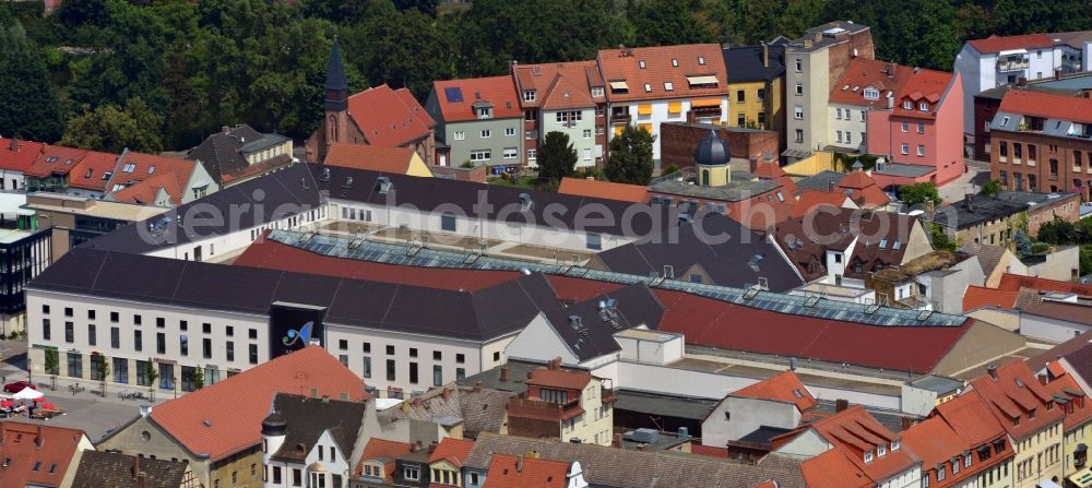 Wittenberg from the bird's eye view: View of the construction site of the shopping center Arsenal between the Arsenal square and the market place in the inner city of Wittenberg. Project developers are MIB AG and the OFB Development GmbH