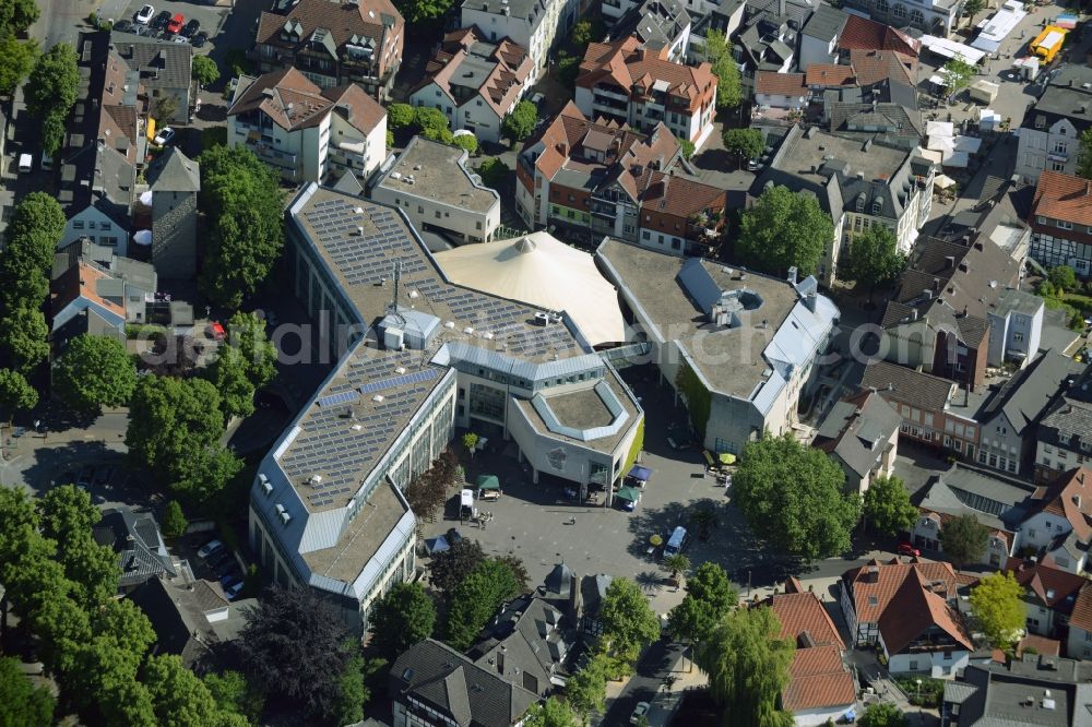 Menden (Sauerland) from above - View of the new town hall of Menden in the state of North Rhine-Westphalia. The administrative offices with the cross-like shape and white tent are located on Neumarkt in the town centre