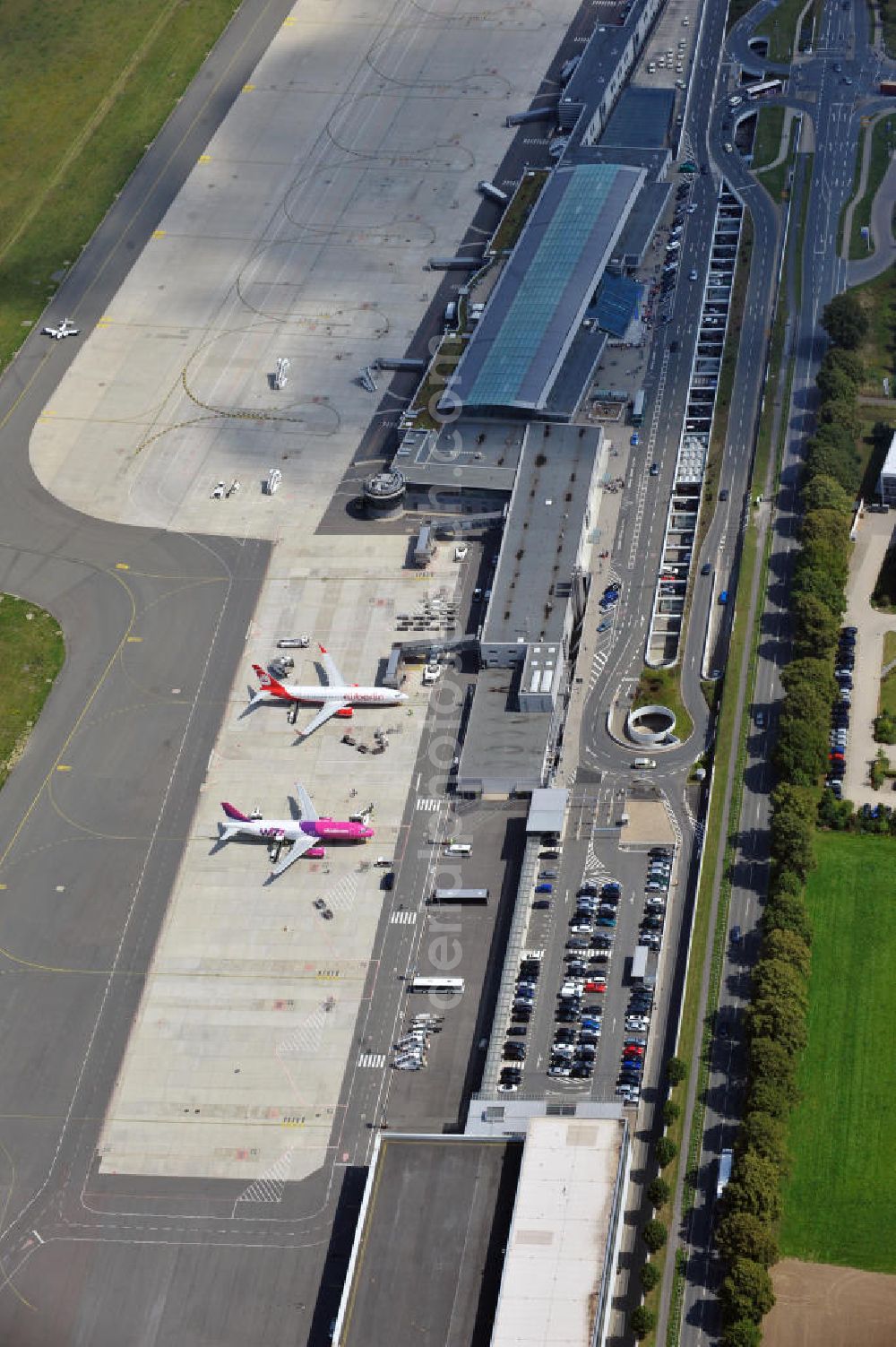 Dortmund from the bird's eye view: View of the new terminal of the Dortmund Airport 21 in the east of the city. The former airfield has become a major commercial airport in North Rhine-Westphalia