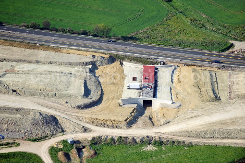 Aerial image Magdala - Blick auf die Bauarbeiten zur Neutrassierung / Verlegung der Bundesautobahn BAB A4 zwischen den Anschlussstellen AS Magdala und Jena/Göschwitz. Bauherr des sechstreifiger Neubau des Autobahnabschnittes ist die DEGES Deutsche Einheit Fernstraßenplanungs- und -bau GmbH. Construction work on the realignment / relocation of the federal motorway A4 motorway between junctions AS Magdalene and Jena / Göschwitz. Die Ingenieurgruppe BEB ist mit der Projektsteuerung beauftragt.