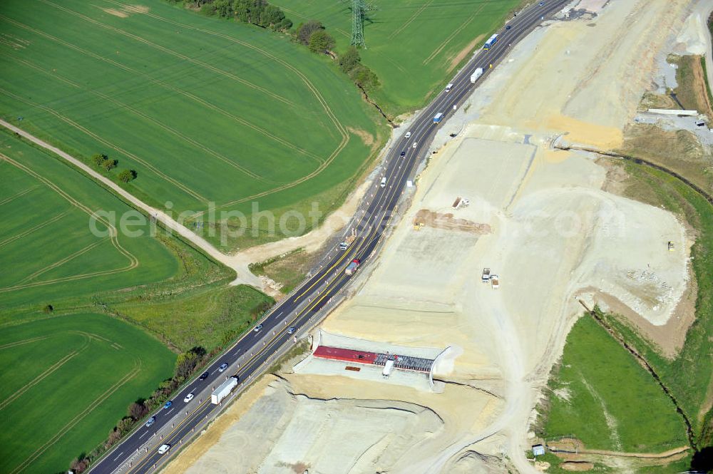 Aerial image Magdala - Blick auf die Bauarbeiten zur Neutrassierung / Verlegung der Bundesautobahn BAB A4 zwischen den Anschlussstellen AS Magdala und Jena/Göschwitz. Bauherr des sechstreifiger Neubau des Autobahnabschnittes ist die DEGES Deutsche Einheit Fernstraßenplanungs- und -bau GmbH. Construction work on the realignment / relocation of the federal motorway A4 motorway between junctions AS Magdalene and Jena / Göschwitz. Die Ingenieurgruppe BEB ist mit der Projektsteuerung beauftragt.