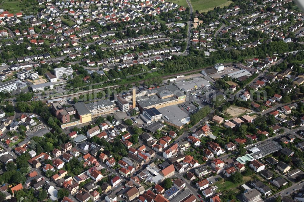 Aerial photograph Nieder-Olm - Local View of Nieder-Olm in Rhineland-Palatinate, at the center the factory of the manufacturer of beverages Eckes