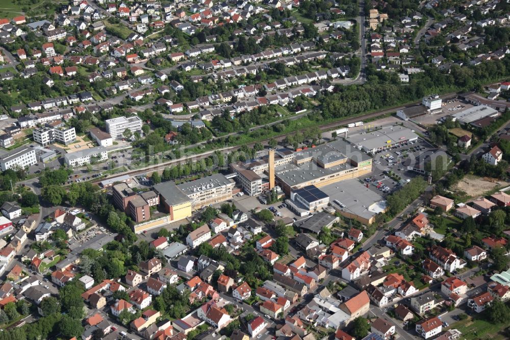 Nieder-Olm from the bird's eye view: Local View of Nieder-Olm in Rhineland-Palatinate, at the center the factory of the manufacturer of beverages Eckes