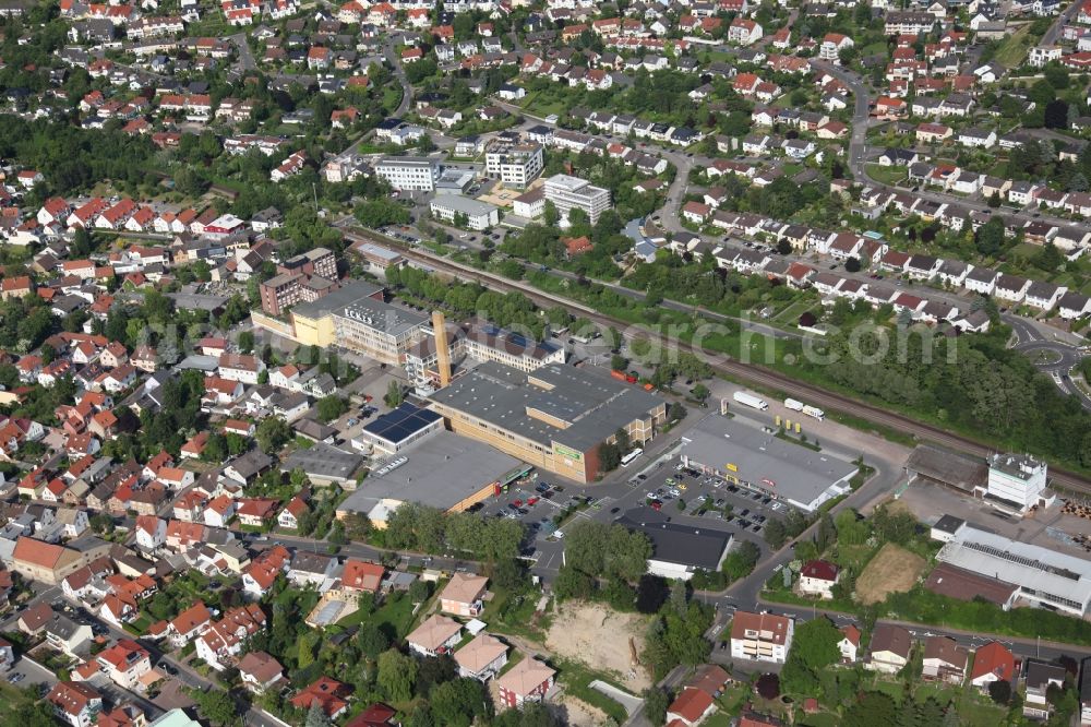 Aerial image Nieder-Olm - Local View of Nieder-Olm in Rhineland-Palatinate, at the center the factory of the manufacturer of beverages Eckes