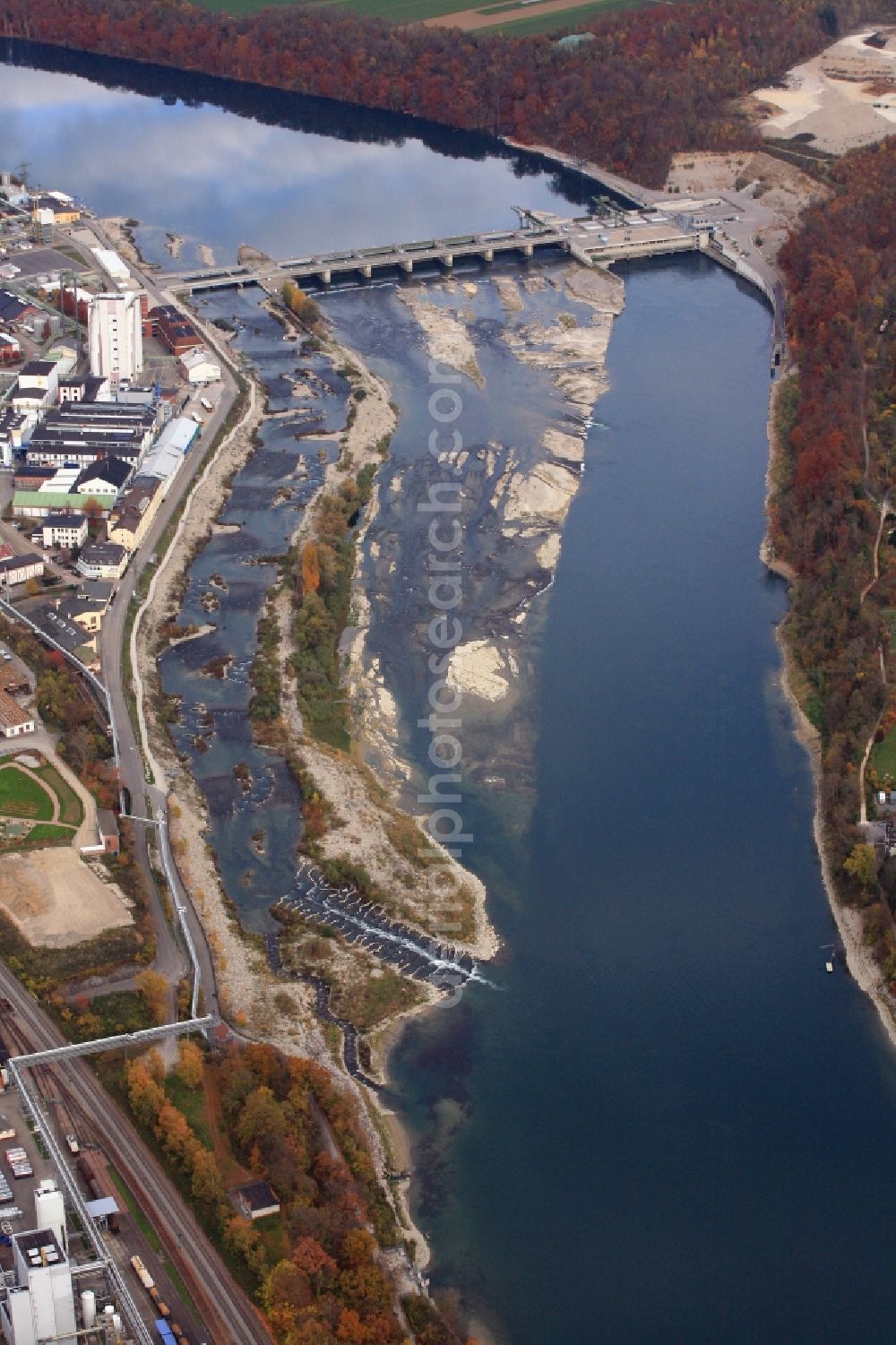 Rheinfelden (Baden) from above - Low Tide at the weir on the river Rhine hydropower plant in Rheinfelden (Baden) in the state of Baden-Wuerttemberg. The rock structures below the weir, the Gwild, is irrigated with a certain amount of water and also the water drain at the fish ladder reduces the useable water flow for electricity generation