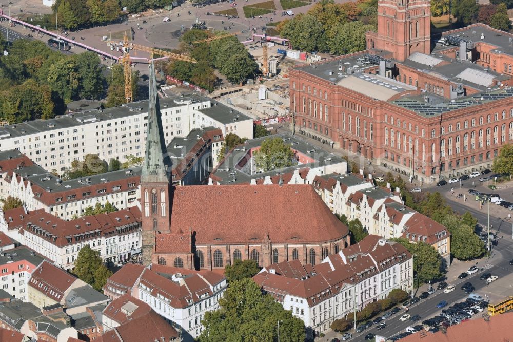 Aerial image Berlin - Nikolai Church and quarter in the Mitte part of Berlin in Germany. The historic quarter is located between the river Spree, Rathausstrasse, Spandauer Strasse and Muehlendamm. It is the oldest residential area of Berlin with the church in its centre