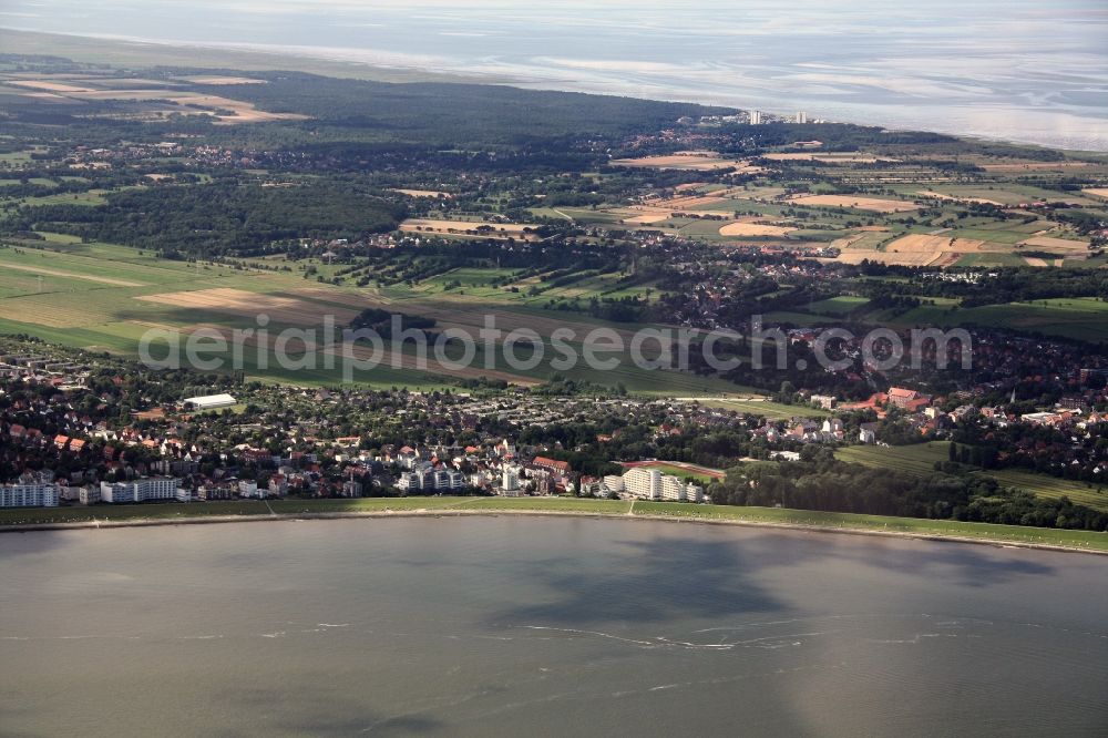 Cuxhaven from the bird's eye view: View of the North Sea coast of Cuxhaven in the federal state Lower Saxony. To see are among others are the dike; the beach, several hotels and guesthouses and parts of the inner city