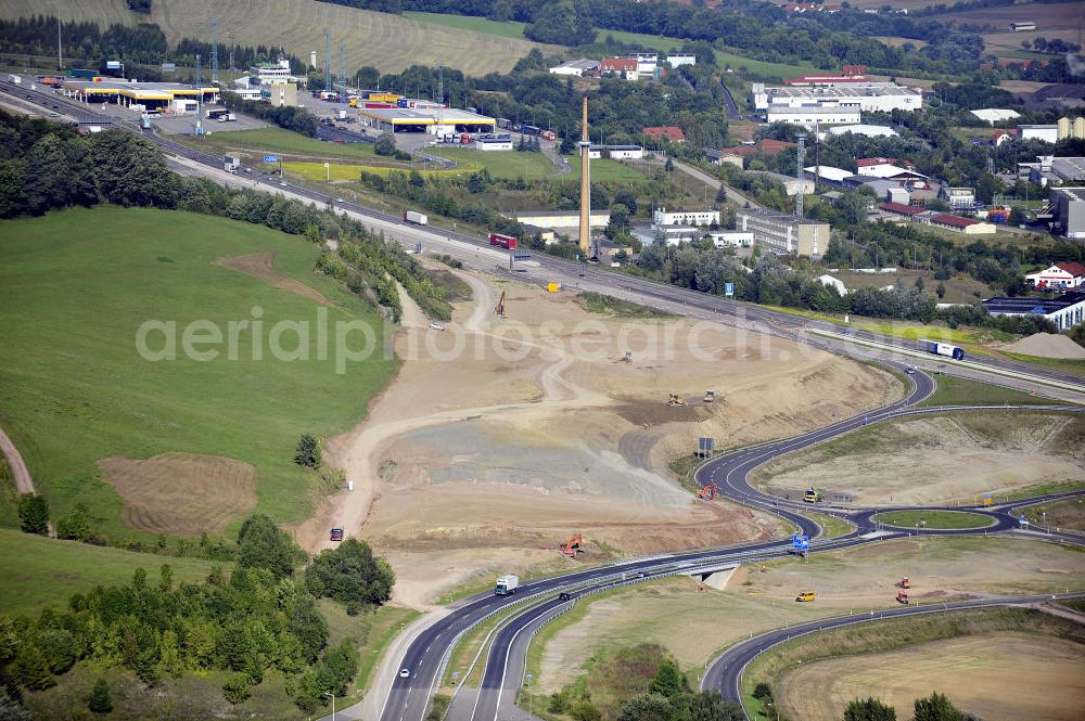 Aerial photograph Eisenach - Blick auf den Verlauf des Projekt Nordverlegung / Umfahrung Hörselberge der Autobahn E40 / A4 in Thüringen bei Eisenach. Durchgeführt werden die im Zuge dieses Projektes notwendigen Arbeiten unter an derem von den Mitarbeitern der Niederlassung Weimar der EUROVIA Verkehrsbau Union sowie der Niederlassungen Abbruch und Erdbau, Betonstraßenbau, Ingenieurbau und TECO Schallschutz der EUROVIA Beton sowie der DEGES.