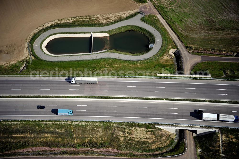 Aerial photograph Eisenach - Blick auf den Verlauf des Projekt Nordverlegung / Umfahrung Hörselberge der Autobahn E40 / A4 in Thüringen bei Eisenach. Durchgeführt werden die im Zuge dieses Projektes notwendigen Arbeiten unter an derem von den Mitarbeitern der Niederlassung Weimar der EUROVIA Verkehrsbau Union sowie der Niederlassungen Abbruch und Erdbau, Betonstraßenbau, Ingenieurbau und TECO Schallschutz der EUROVIA Beton sowie der DEGES.