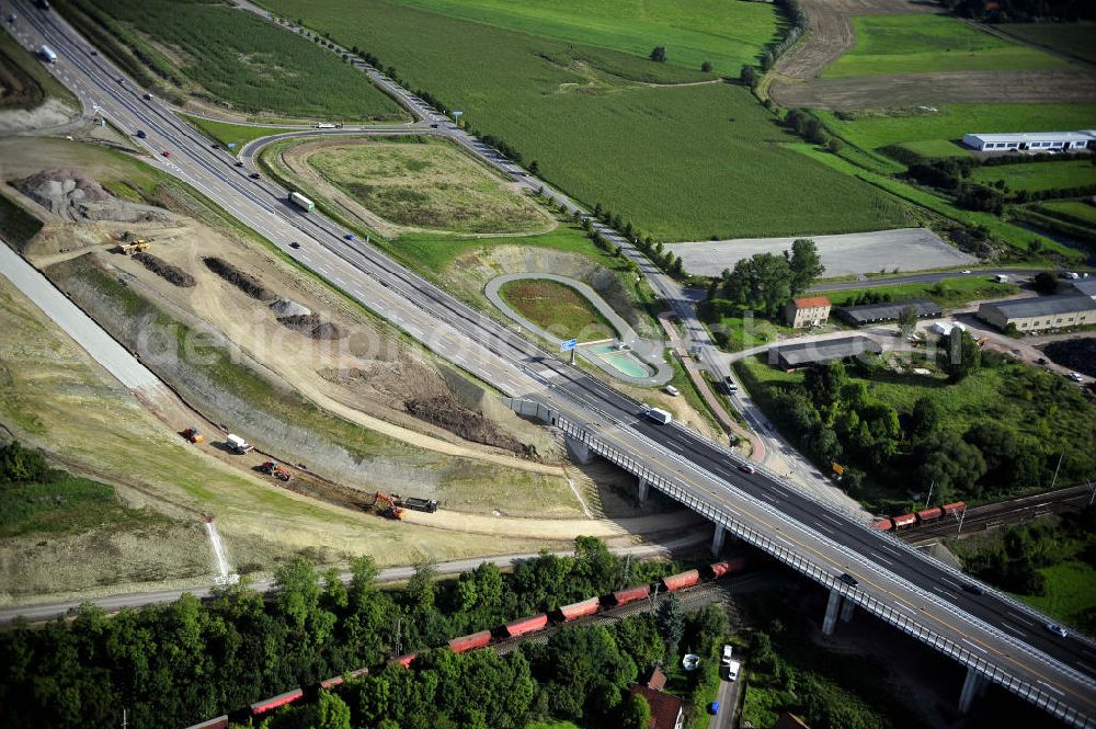 Aerial photograph Eisenach - Blick auf den Verlauf des Projekt Nordverlegung / Umfahrung Hörselberge der Autobahn E40 / A4 in Thüringen bei Eisenach. Durchgeführt werden die im Zuge dieses Projektes notwendigen Arbeiten unter an derem von den Mitarbeitern der Niederlassung Weimar der EUROVIA Verkehrsbau Union sowie der Niederlassungen Abbruch und Erdbau, Betonstraßenbau, Ingenieurbau und TECO Schallschutz der EUROVIA Beton sowie der DEGES.