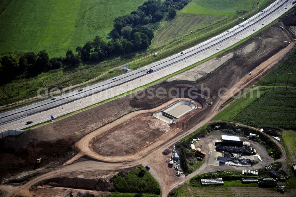 Eisenach from the bird's eye view: Blick auf den Verlauf des Projekt Nordverlegung / Umfahrung Hörselberge der Autobahn E40 / A4 in Thüringen bei Eisenach. Durchgeführt werden die im Zuge dieses Projektes notwendigen Arbeiten unter an derem von den Mitarbeitern der Niederlassung Weimar der EUROVIA Verkehrsbau Union sowie der Niederlassungen Abbruch und Erdbau, Betonstraßenbau, Ingenieurbau und TECO Schallschutz der EUROVIA Beton sowie der DEGES.