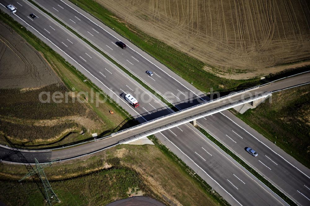 Aerial photograph Eisenach - Blick auf den Verlauf des Projekt Nordverlegung / Umfahrung Hörselberge der Autobahn E40 / A4 in Thüringen bei Eisenach. Durchgeführt werden die im Zuge dieses Projektes notwendigen Arbeiten unter an derem von den Mitarbeitern der Niederlassung Weimar der EUROVIA Verkehrsbau Union sowie der Niederlassungen Abbruch und Erdbau, Betonstraßenbau, Ingenieurbau und TECO Schallschutz der EUROVIA Beton sowie der DEGES.