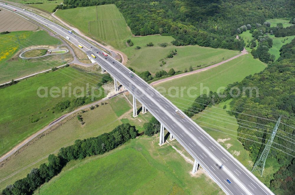 Ettenhausen from the bird's eye view: Die Nessetalbrücke mit einer Länge von 380 Meter. Die Brücke wurde im Zuge des Projekt Nordverlegung / Umfahrung Hörselberge der Autobahn E40 / A4 in Thüringen bei Eisenach erbaut. Durchgeführt wurden die notwendigen Arbeiten unter an derem von den Mitarbeitern der Niederlassung Weimar der EUROVIA Verkehrsbau Union sowie der Niederlassungen Abbruch und Erdbau, Betonstraßenbau, Ingenieurbau und TECO Schallschutz der EUROVIA Beton sowie der DEGES. The bridge was built during the construction of the new bypass system.