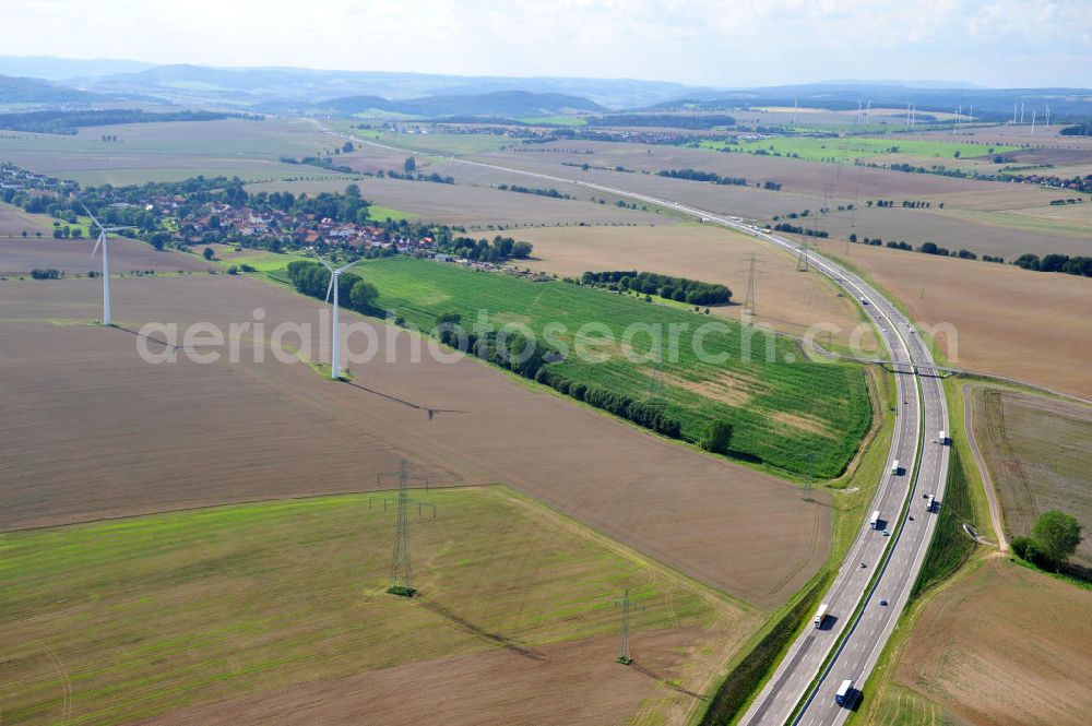 Hötzelsroda from the bird's eye view: Neuer A4 Autobahnabschnitt, erbaut im Zuge des Projekt Nordverlegung / Umfahrung Hörselberge der Autobahn E40 / A4 in Thüringen bei Eisenach. Durchgeführt wurden die notwendigen Arbeiten unter an derem von den Mitarbeitern der Niederlassung Weimar der EUROVIA Verkehrsbau Union sowie der Niederlassungen Abbruch und Erdbau, Betonstraßenbau, Ingenieurbau und TECO Schallschutz der EUROVIA Beton sowie der DEGES. Construction of new bypass system.