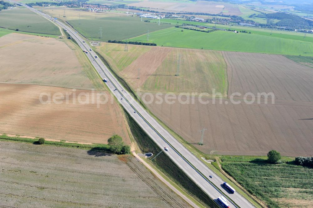 Hötzelsroda from above - Neuer A4 Autobahnabschnitt, erbaut im Zuge des Projekt Nordverlegung / Umfahrung Hörselberge der Autobahn E40 / A4 in Thüringen bei Eisenach. Durchgeführt wurden die notwendigen Arbeiten unter an derem von den Mitarbeitern der Niederlassung Weimar der EUROVIA Verkehrsbau Union sowie der Niederlassungen Abbruch und Erdbau, Betonstraßenbau, Ingenieurbau und TECO Schallschutz der EUROVIA Beton sowie der DEGES. Construction of new bypass system.