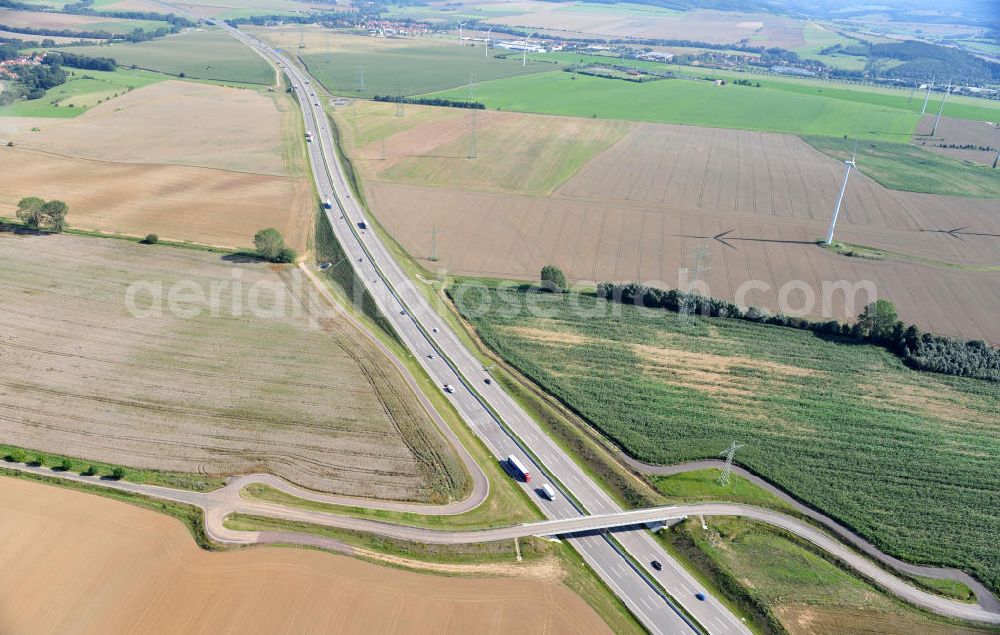 Hötzelsroda from the bird's eye view: Neuer A4 Autobahnabschnitt, erbaut im Zuge des Projekt Nordverlegung / Umfahrung Hörselberge der Autobahn E40 / A4 in Thüringen bei Eisenach. Durchgeführt wurden die notwendigen Arbeiten unter an derem von den Mitarbeitern der Niederlassung Weimar der EUROVIA Verkehrsbau Union sowie der Niederlassungen Abbruch und Erdbau, Betonstraßenbau, Ingenieurbau und TECO Schallschutz der EUROVIA Beton sowie der DEGES. Construction of new bypass system.