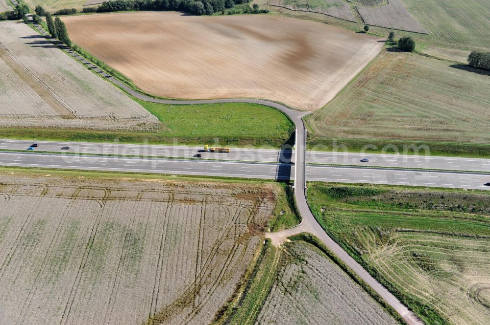 Neukirchen from the bird's eye view: Neuer A4 Autobahnabschnitt, erbaut im Zuge des Projekt Nordverlegung / Umfahrung Hörselberge der Autobahn E40 / A4 in Thüringen bei Eisenach. Durchgeführt wurden die notwendigen Arbeiten unter an derem von den Mitarbeitern der Niederlassung Weimar der EUROVIA Verkehrsbau Union sowie der Niederlassungen Abbruch und Erdbau, Betonstraßenbau, Ingenieurbau und TECO Schallschutz der EUROVIA Beton sowie der DEGES. Construction of new bypass system.