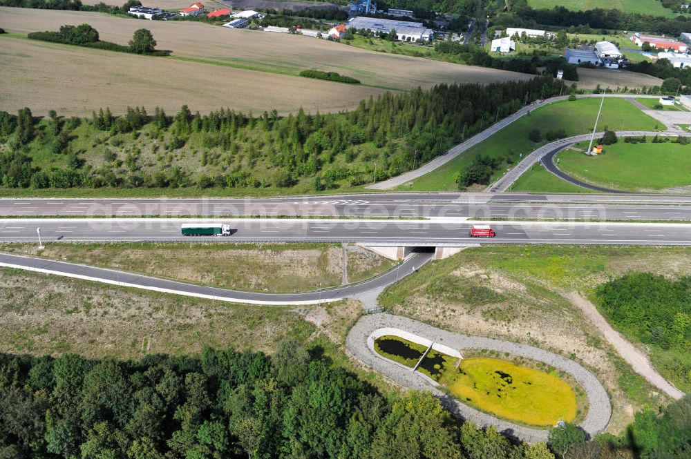 Aerial image Eisenach - Neuer A4 Autobahnabschnitt, erbaut im Zuge des Projekt Nordverlegung / Umfahrung Hörselberge der Autobahn E40 / A4 in Thüringen bei Eisenach. Durchgeführt wurden die notwendigen Arbeiten unter an derem von den Mitarbeitern der Niederlassung Weimar der EUROVIA Verkehrsbau Union sowie der Niederlassungen Abbruch und Erdbau, Betonstraßenbau, Ingenieurbau und TECO Schallschutz der EUROVIA Beton sowie der DEGES. Construction of new bypass system.