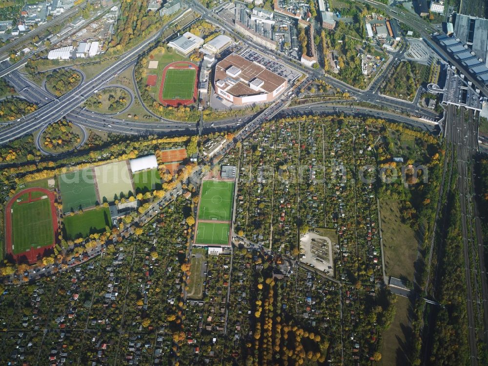 Berlin from above - Northern edge of Schoeneberger Suedgelaende on Vorarlberger Damm and motorway junction Schoeneberg in the district of Tempelhof-Schoeneberg in Berlin in Germany. A furniture store as well as several sports facilities are located around the clover-leaf interchange. An area of allotements forms the Northern edge of the Suedgelaende area