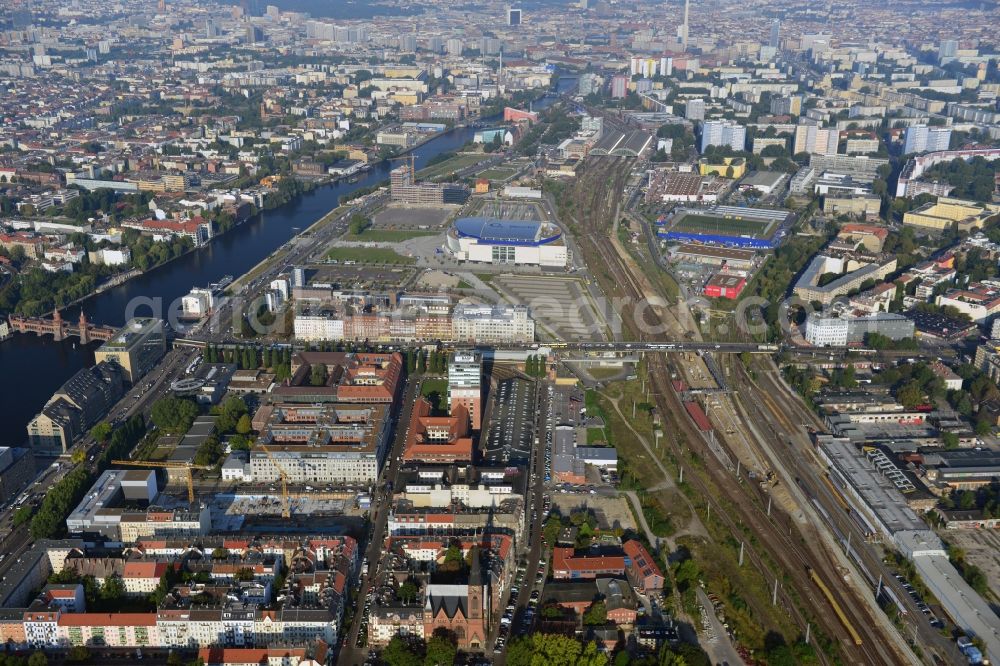 Berlin from above - View at the restored building of the monument protected former Osram respectively Narva company premises Oberbaum City in the district Friedrichshain in Berlin. Here, among many other companies, BASF Services Europe, the German Post Customer Service Center GmbH and Heineken Germany GmbH are located. It is owned by HVB Immobilien AG, which is part of the UniCredit Group