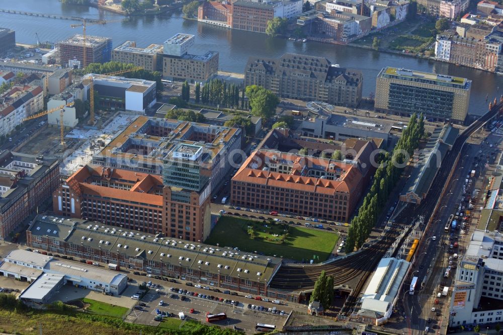 Berlin from the bird's eye view: View at the restored building of the monument protected former Osram respectively Narva company premises Oberbaum City in the district Friedrichshain in Berlin. Here, among many other companies, BASF Services Europe, the German Post Customer Service Center GmbH and Heineken Germany GmbH are located. It is owned by HVB Immobilien AG, which is part of the UniCredit Group