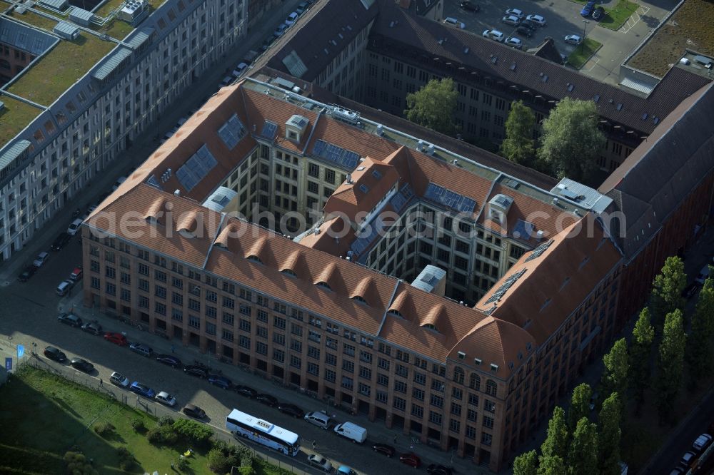 Berlin from the bird's eye view: View at the restored building of the monument protected former Osram respectively Narva company premises Oberbaum City in the district Friedrichshain in Berlin. Here, among many other companies, BASF Services Europe, the German Post Customer Service Center GmbH and Heineken Germany GmbH are located. It is owned by HVB Immobilien AG, which is part of the UniCredit Group