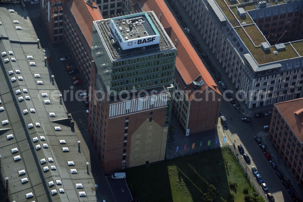 Berlin from above - View at the restored building of the monument protected former Osram respectively Narva company premises Oberbaum City in the district Friedrichshain in Berlin. Here, among many other companies, BASF Services Europe, the German Post Customer Service Center GmbH and Heineken Germany GmbH are located. It is owned by HVB Immobilien AG, which is part of the UniCredit Group