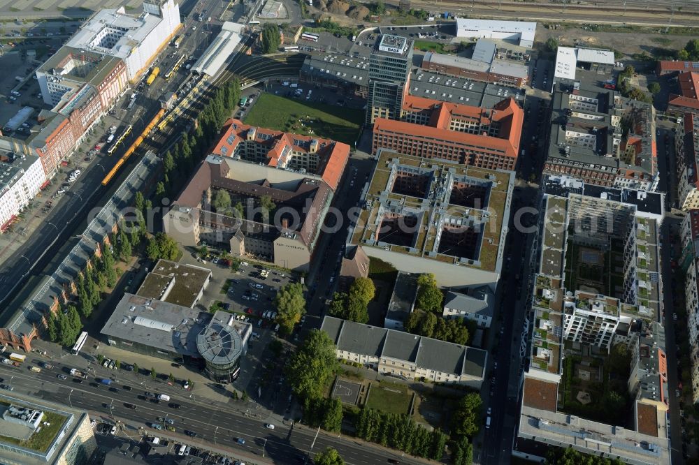 Berlin from above - View at the restored building of the monument protected former Osram respectively Narva company premises Oberbaum City in the district Friedrichshain in Berlin. Here, among many other companies, BASF Services Europe, the German Post Customer Service Center GmbH and Heineken Germany GmbH are located. It is owned by HVB Immobilien AG, which is part of the UniCredit Group