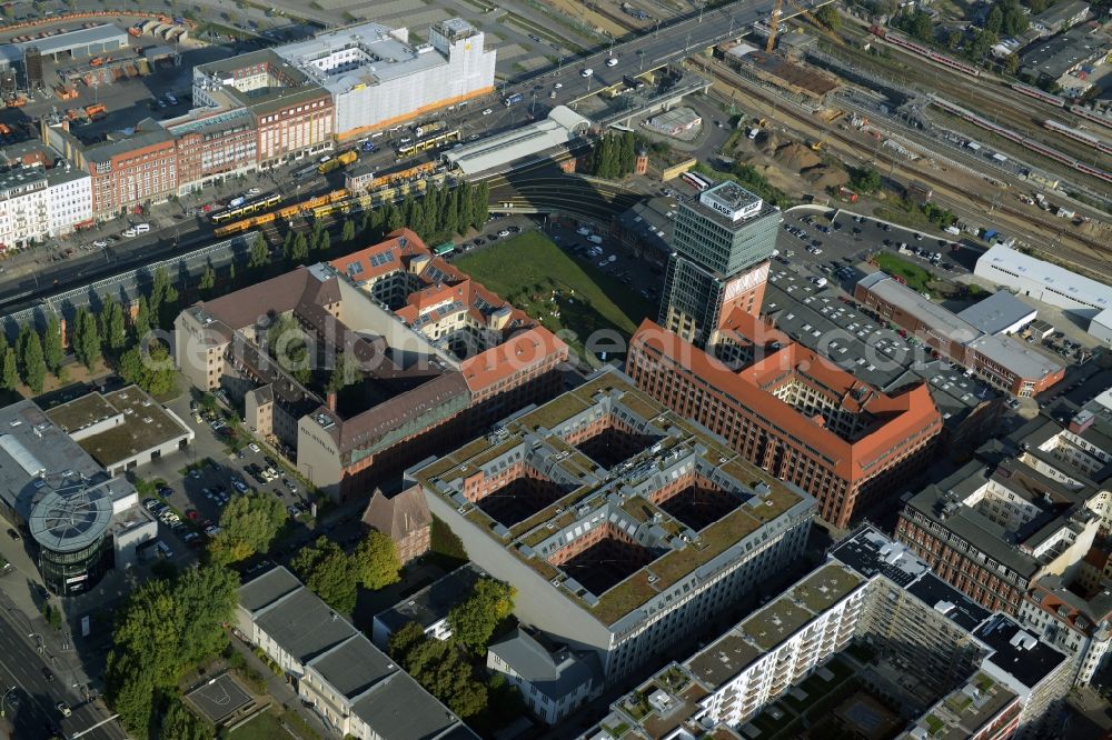 Berlin from the bird's eye view: View at the restored building of the monument protected former Osram respectively Narva company premises Oberbaum City in the district Friedrichshain in Berlin. Here, among many other companies, BASF Services Europe, the German Post Customer Service Center GmbH and Heineken Germany GmbH are located. It is owned by HVB Immobilien AG, which is part of the UniCredit Group