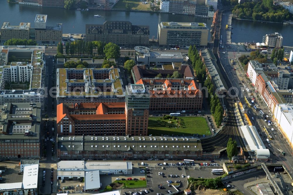 Berlin from the bird's eye view: View at the restored building of the monument protected former Osram respectively Narva company premises Oberbaum City in the district Friedrichshain in Berlin. Here, among many other companies, BASF Services Europe, the German Post Customer Service Center GmbH and Heineken Germany GmbH are located. It is owned by HVB Immobilien AG, which is part of the UniCredit Group