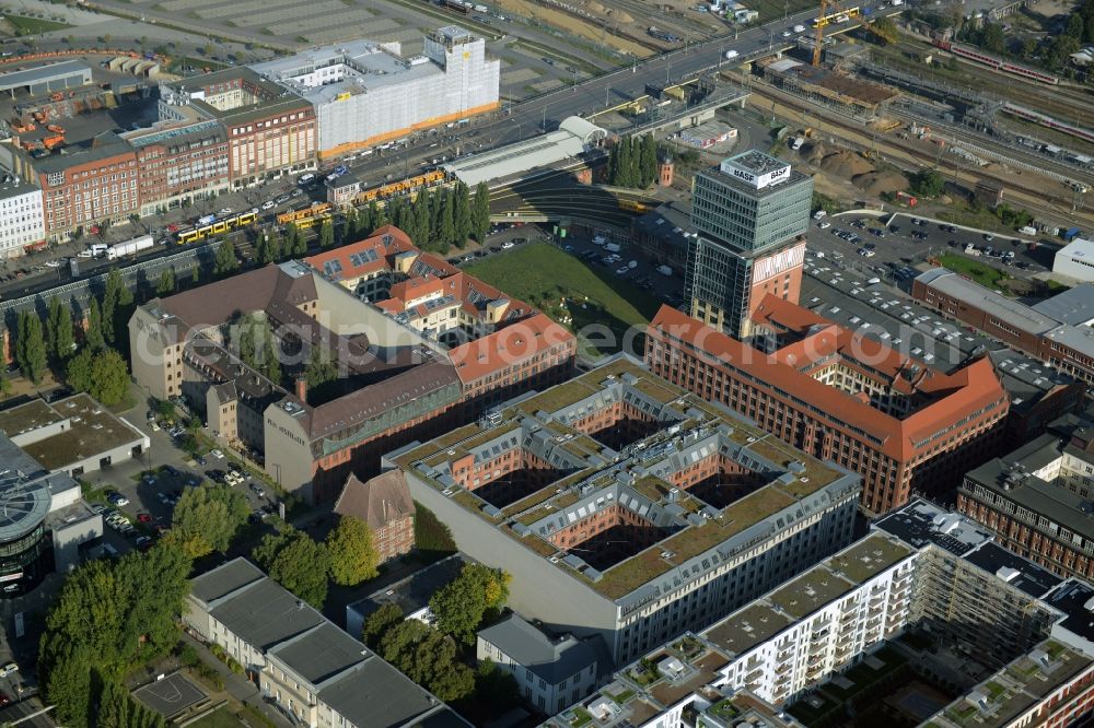 Berlin from the bird's eye view: View at the restored building of the monument protected former Osram respectively Narva company premises Oberbaum City in the district Friedrichshain in Berlin. Here, among many other companies, BASF Services Europe, the German Post Customer Service Center GmbH and Heineken Germany GmbH are located. It is owned by HVB Immobilien AG, which is part of the UniCredit Group