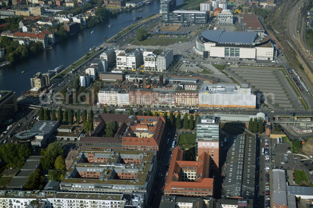 Berlin from the bird's eye view: View at the restored building of the monument protected former Osram respectively Narva company premises Oberbaum City in the district Friedrichshain in Berlin. Here, among many other companies, BASF Services Europe, the German Post Customer Service Center GmbH and Heineken Germany GmbH are located. It is owned by HVB Immobilien AG, which is part of the UniCredit Group