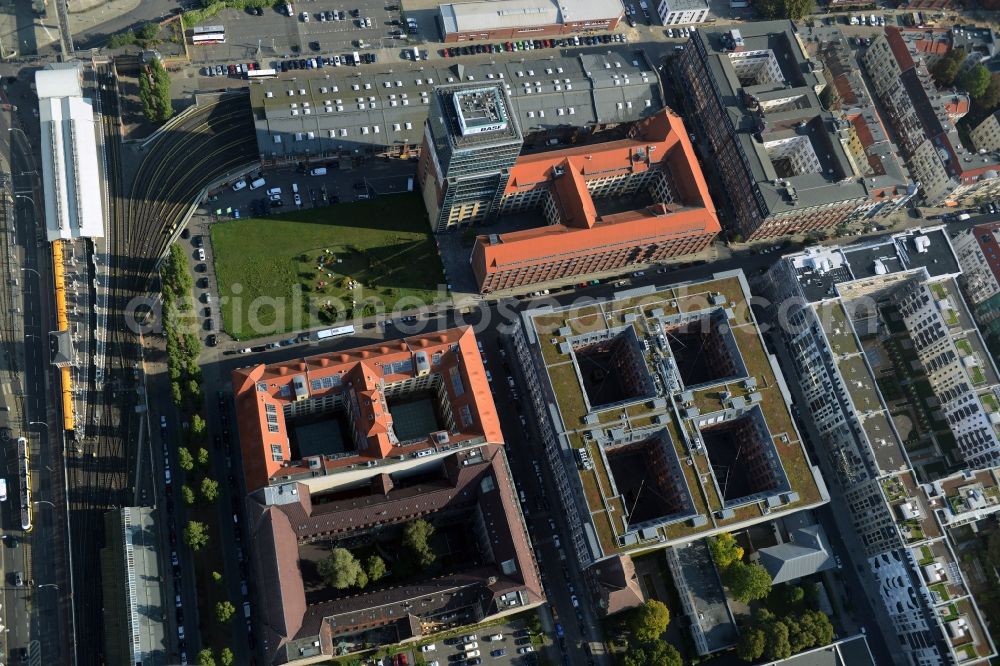 Aerial image Berlin - View at the restored building of the monument protected former Osram respectively Narva company premises Oberbaum City in the district Friedrichshain in Berlin. Here, among many other companies, BASF Services Europe, the German Post Customer Service Center GmbH and Heineken Germany GmbH are located. It is owned by HVB Immobilien AG, which is part of the UniCredit Group