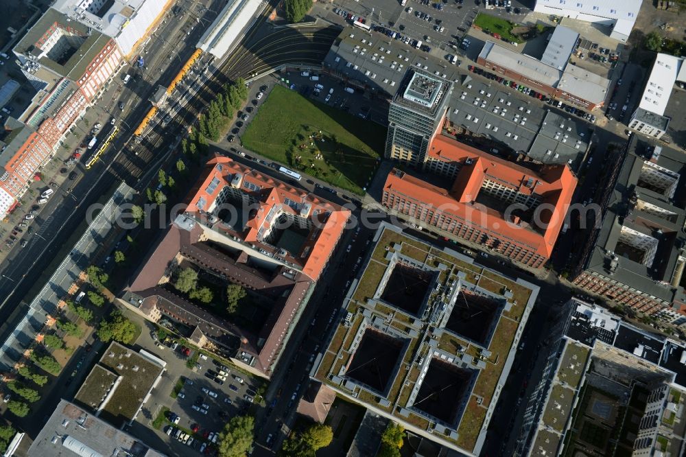 Berlin from above - View at the restored building of the monument protected former Osram respectively Narva company premises Oberbaum City in the district Friedrichshain in Berlin. Here, among many other companies, BASF Services Europe, the German Post Customer Service Center GmbH and Heineken Germany GmbH are located. It is owned by HVB Immobilien AG, which is part of the UniCredit Group