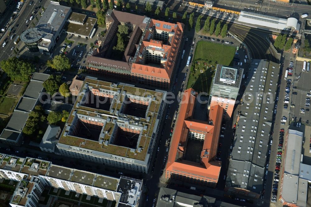 Aerial photograph Berlin - View at the restored building of the monument protected former Osram respectively Narva company premises Oberbaum City in the district Friedrichshain in Berlin. Here, among many other companies, BASF Services Europe, the German Post Customer Service Center GmbH and Heineken Germany GmbH are located. It is owned by HVB Immobilien AG, which is part of the UniCredit Group