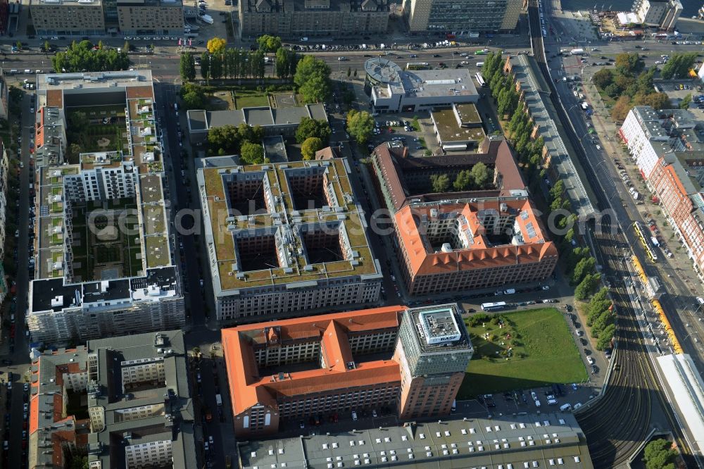 Berlin from the bird's eye view: View at the restored building of the monument protected former Osram respectively Narva company premises Oberbaum City in the district Friedrichshain in Berlin. Here, among many other companies, BASF Services Europe, the German Post Customer Service Center GmbH and Heineken Germany GmbH are located. It is owned by HVB Immobilien AG, which is part of the UniCredit Group