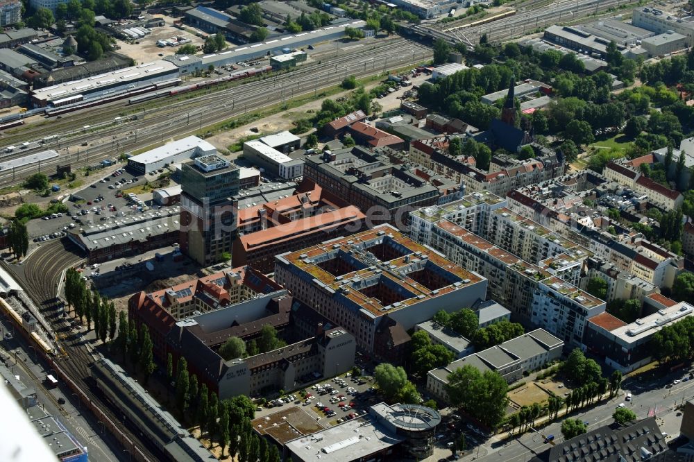 Aerial image Berlin - View at the restored building of the monument protected former Osram respectively Narva company premises Oberbaum City in the district Friedrichshain in Berlin. Here, among many other companies, BASF Services Europe, the German Post Customer Service Center GmbH and Heineken Germany GmbH are located. It is owned by HVB Immobilien AG, which is part of the UniCredit Group