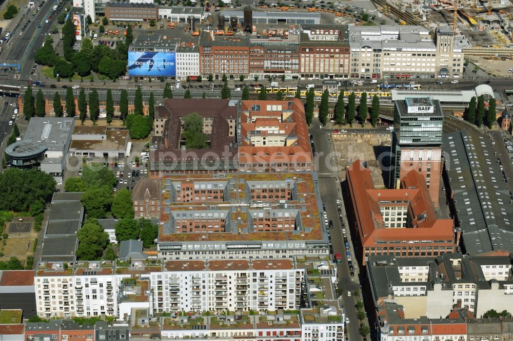 Berlin from the bird's eye view: View at the restored building of the monument protected former Osram respectively Narva company premises Oberbaum City in the district Friedrichshain in Berlin. Here, among many other companies, BASF Services Europe, the German Post Customer Service Center GmbH and Heineken Germany GmbH are located. It is owned by HVB Immobilien AG, which is part of the UniCredit Group